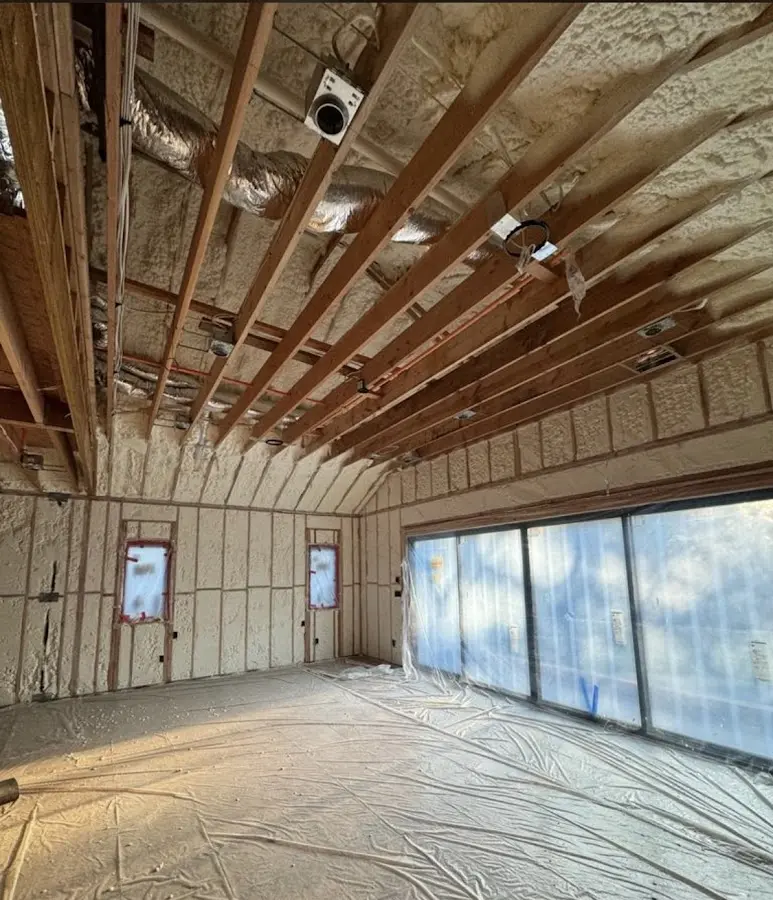 Interior walls and ceiling insulated with spray foam during new construction in Union